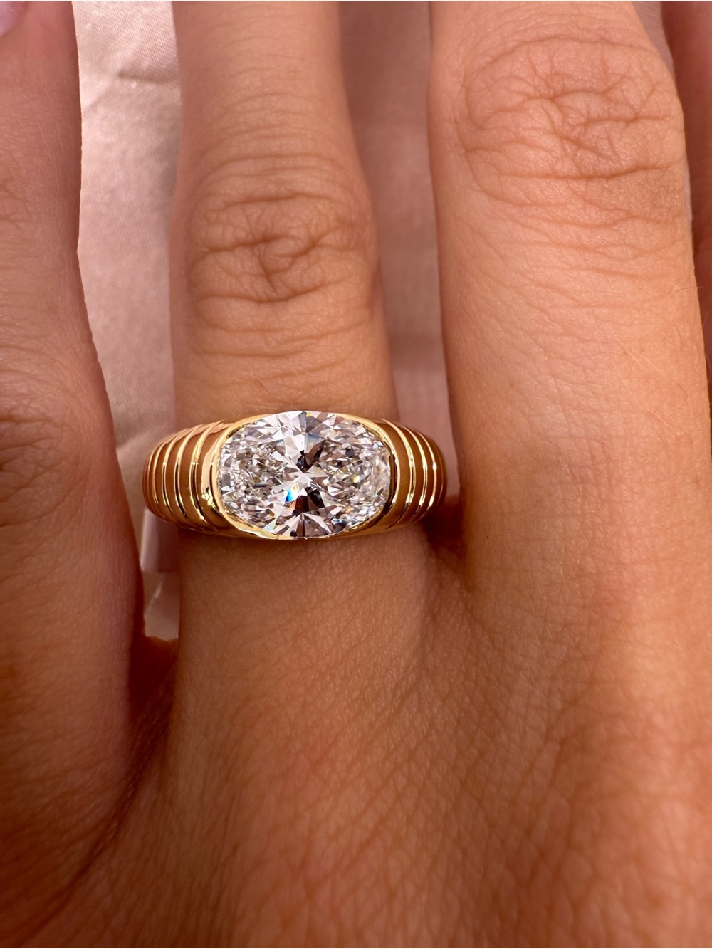 2.01 carat E VS1 east west oval lab diamond croissant band